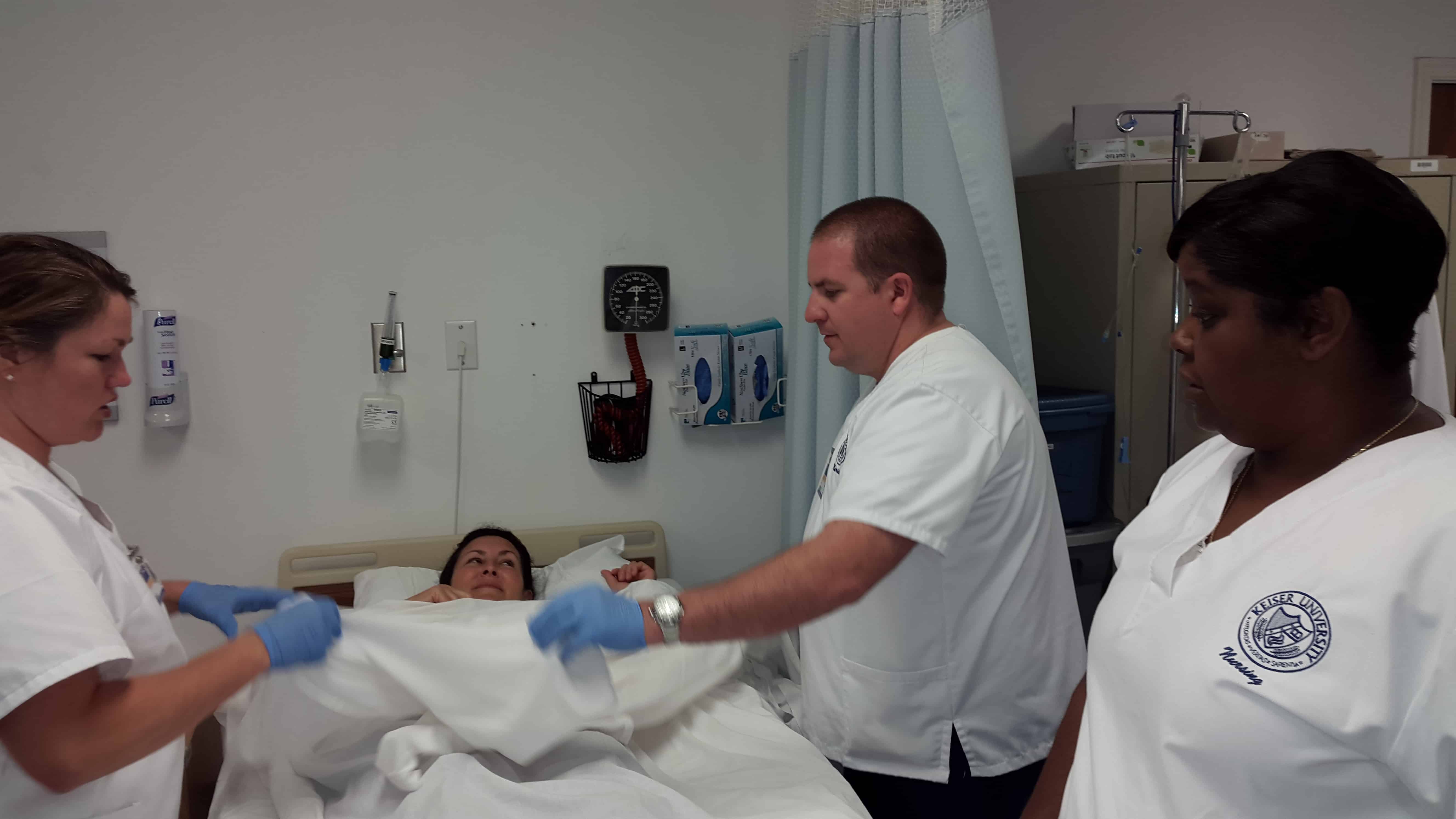 Nurses brushing teeth May 2015 (1) Keiser University