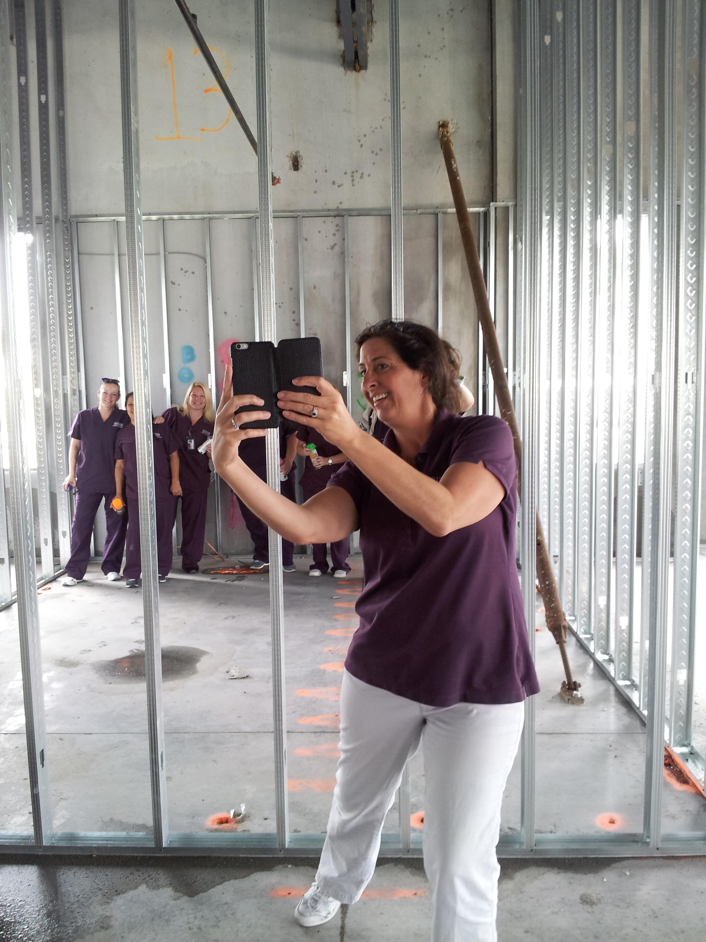 Students at the Melbourne Campus Paint the Walls of the New Building