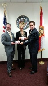 Fellows and Sen. Aaron Bean with his candybars