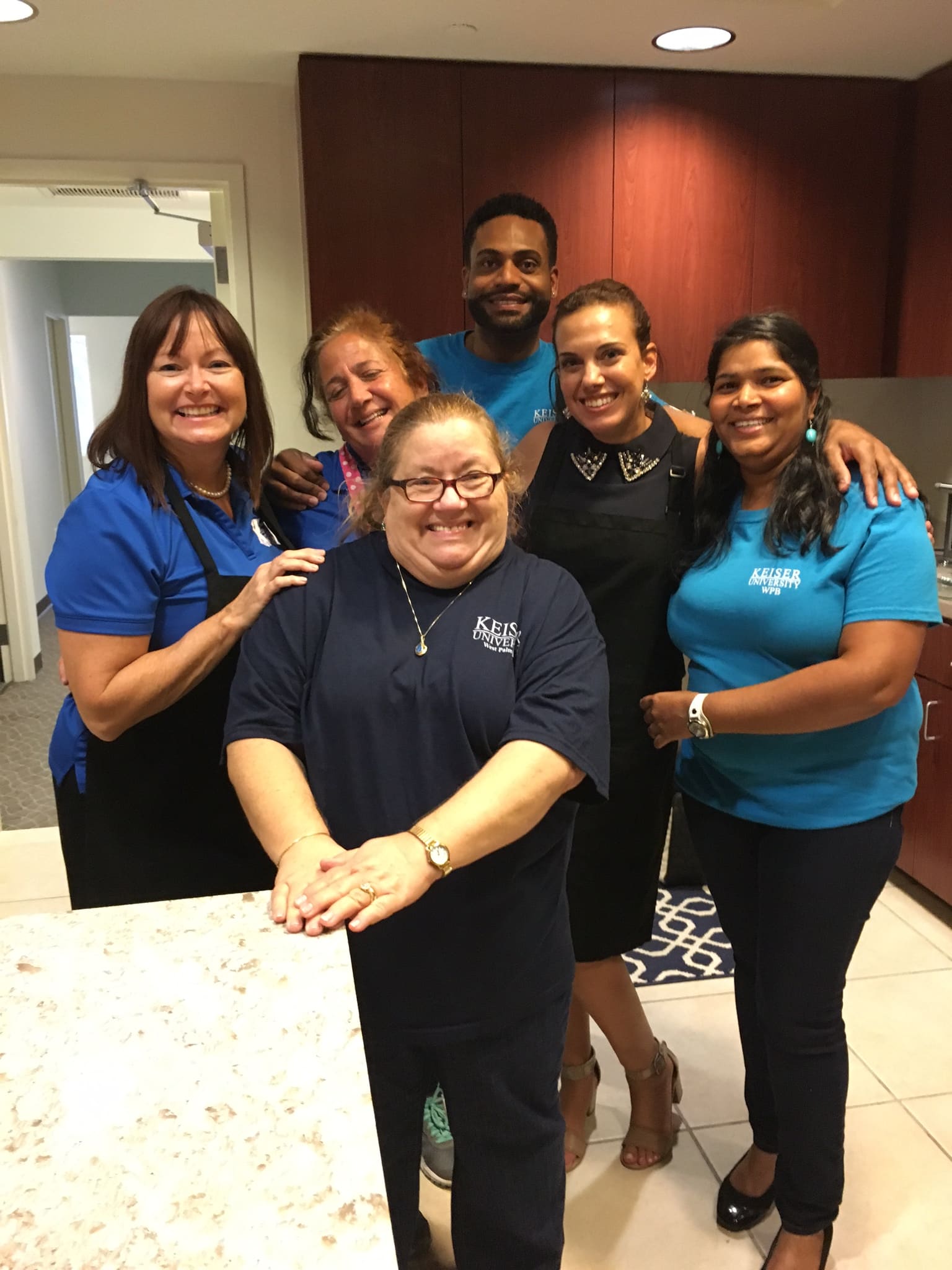 Faculty and Staff from the West Palm Beach Campus Volunteer at Quantum House