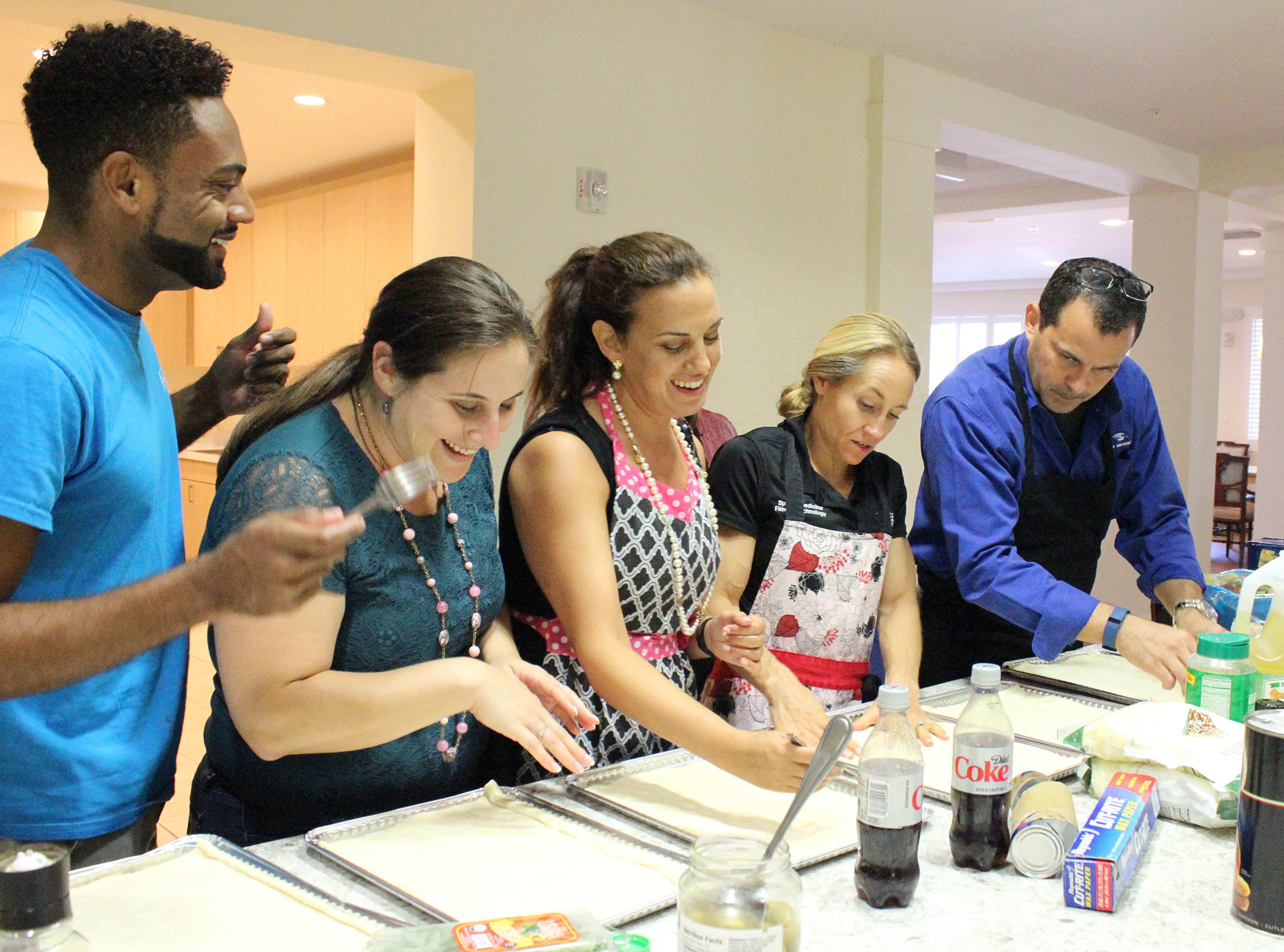 West Palm Beach Staff and Faculty Volunteer at Quantum House Keiser