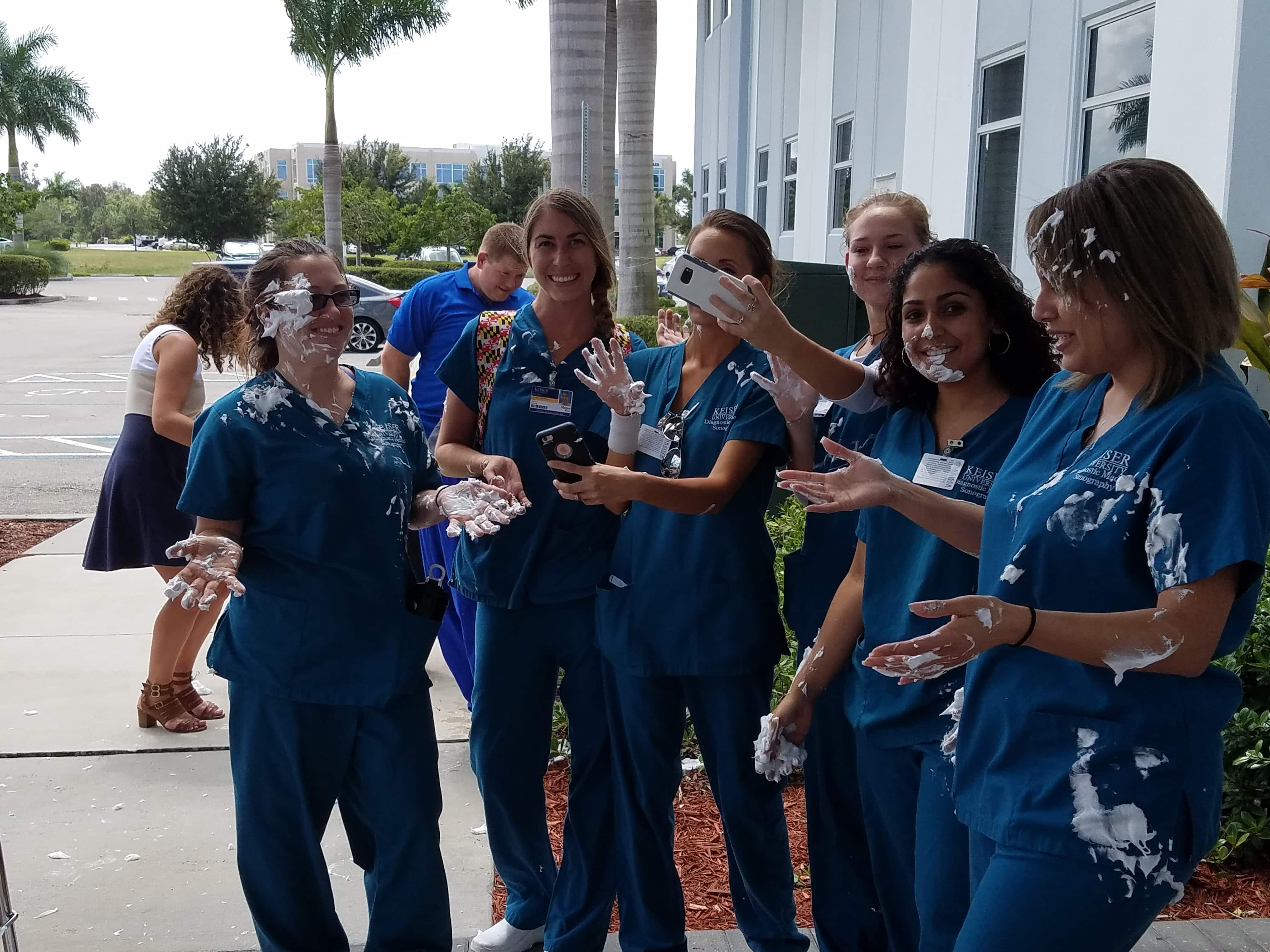 Fort Myers Faculty and Staff Take Pies to the Face for Cystic Fibrosis 