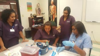 Ma Mlt May 2017 1 - Orlando Medical Assisting And Medical Laboratory Technician Students Work Together - Academics