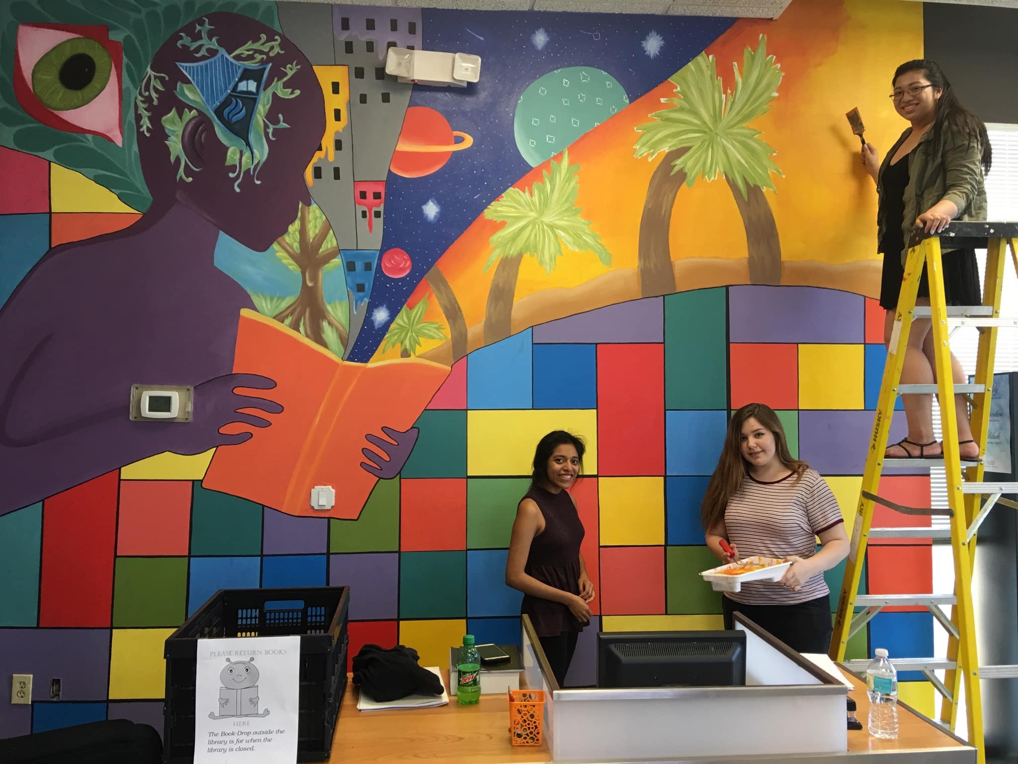 Local High School Art Students Paint Murals in New Port Richey Campus Library