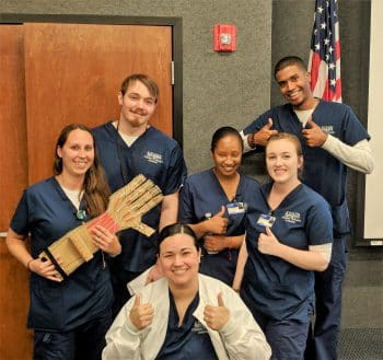 Photo 3 - Physical Therapist Assistant Students At The Melbourne Campus Built Custom Mechanical Hands For Their Kinesiology Project. - Academics
