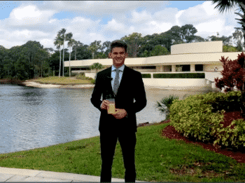 Ross Standing With Shake - Ku Student Unveils Protein Powder Made Of Crickets At Keiser University’s Seahawk Tank Pitch Contest - Academics