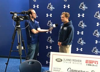 Cameron Provines Is Interviewed By Espn For Landrover Scholarship Award Low Res B 6 19 - Treasure Coast Athlete Receives Surprise Land Rover Scholarship At Keiser University - Keiser University Flagship