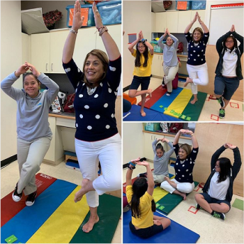 Occupational therapist leading children in therapy, doing yoga poses