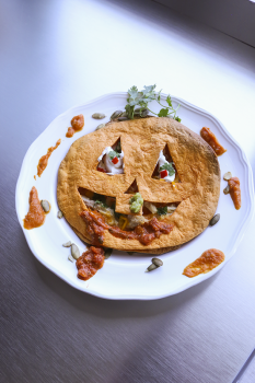 Photo of a Jack-O-Dilla, a Halloween inspired quesadilla