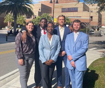 Keiser University DECA students Melissa Brooks, Amarri Davis, Dr. Racquel Elliott, Thomas Filegar, and Brett Stallo