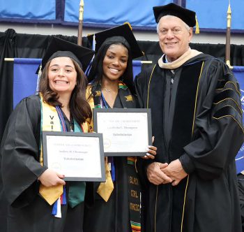 Co-Valedictorians Audrey Chouraqui and Errolesha Thompson With KU Flagship Campus President Dr Gary Vonk 