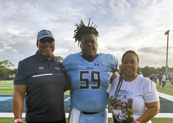 Keiser University Football Player Rod Carter Center With His Father Rod Carter Sr And His Mother Earthly Carter - As Championship Approaches, Keiser University Football Player Sends Appreciation To Supportive Circle - Keiser University Flagship