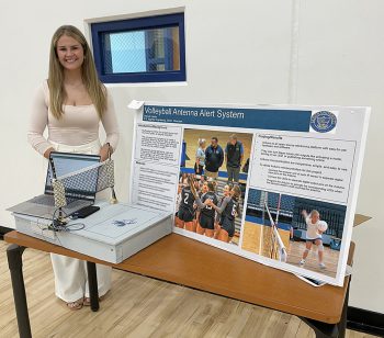 Ku Flagship Senior Hannah Heide With Her Volleyball Antennae Alert System - Keiser University Graduate And Star Volleyball Player Unveils Techy Tool For Fellow Players - Graduate Spotlight
