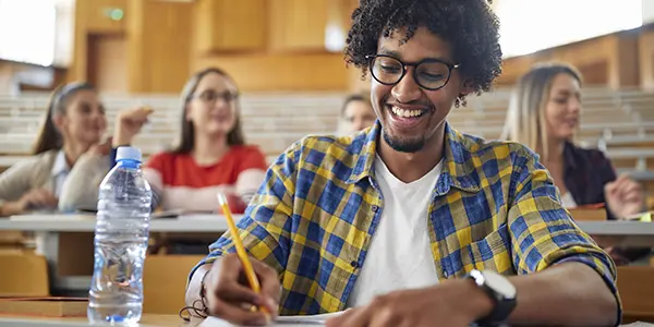 General studies associate degree student studying various academic subjects in a classroom setting