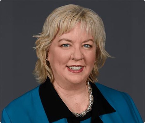 Christine Mueller, Chief Nurse Administrator at Keiser University, posing in professional attire.