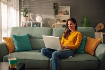 Online student studying on a laptop at home