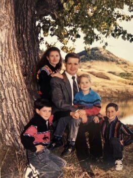 John Stuart with his wife and three sons, celebrating a family legacy of military service, education, and leadership.